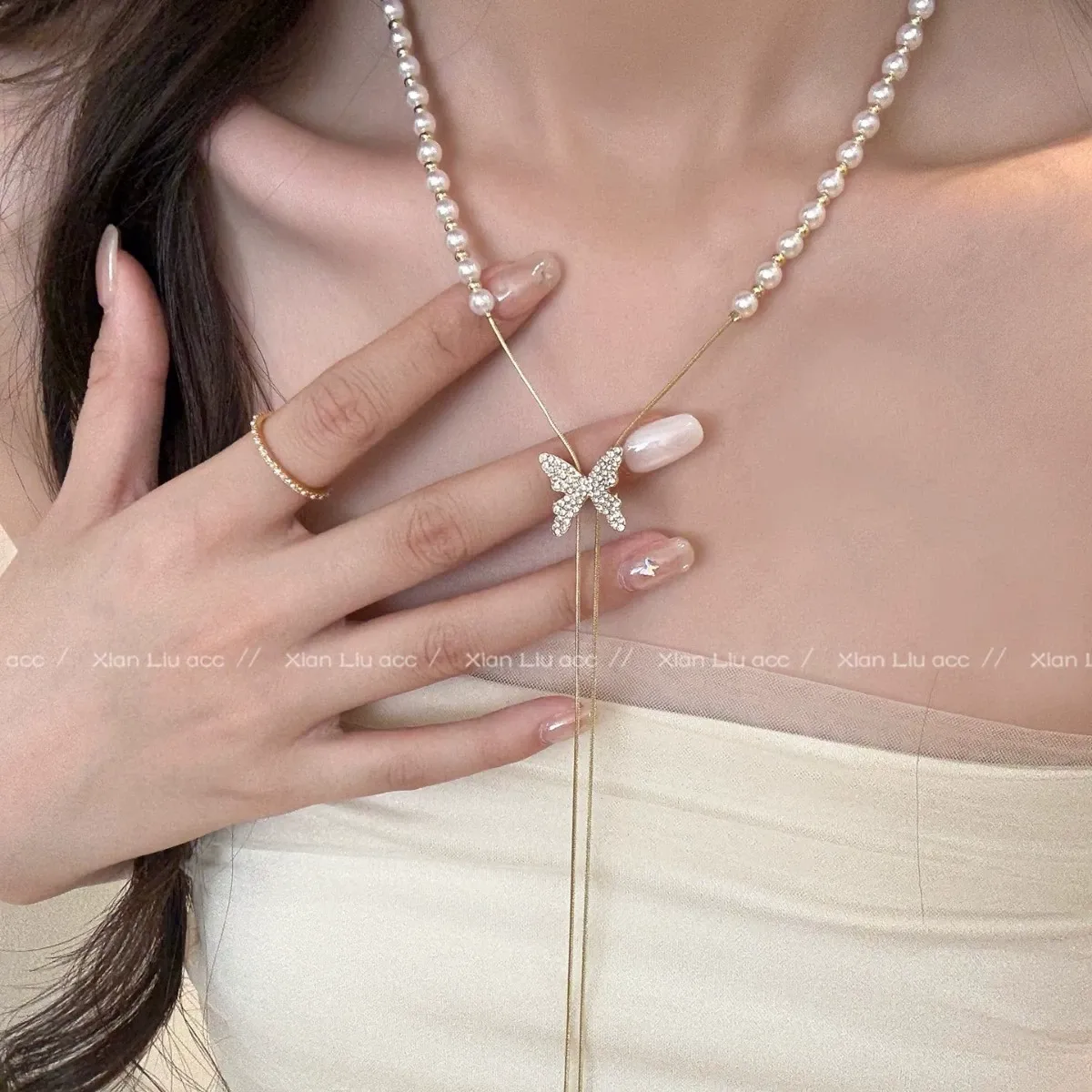 Elegant Pearl Bow Tassel Adjustable Necklace for Women – Light Luxury Clavicle Chain with Premium Feel