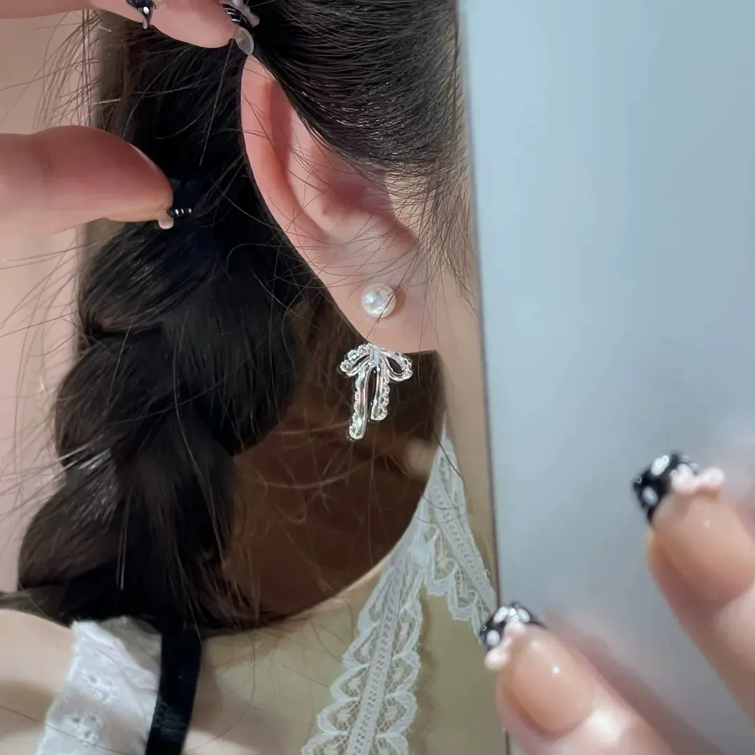 Ballet-style bow ear studs matte silver
