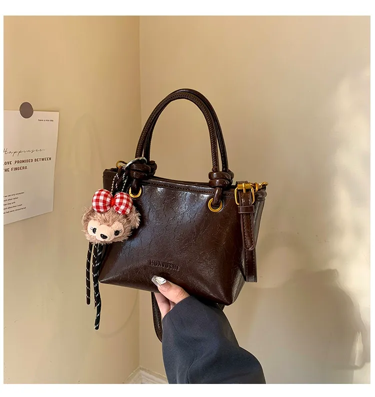 Retro waxed leather crossbody handbag in coffee color (with pendant)