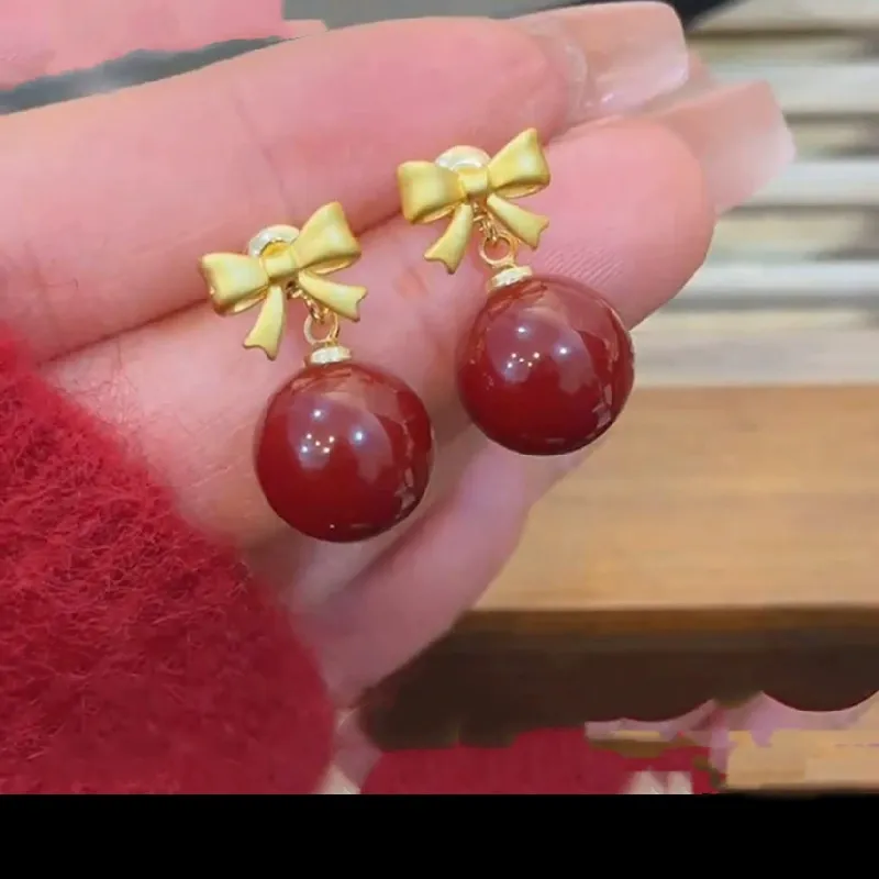 Ankara Ruby Bow Duo | Convertible Pearl Earrings - Gallery-Worthy Red