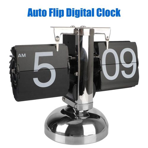 Creative automatic page - turning clock. A retro living room ornament with a modern and simple design. It's the Miaoke table clock, a single - leg small balance flip - card clock.