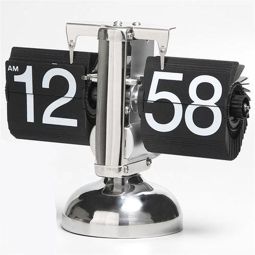 Creative automatic page - turning clock. A retro living room ornament with a modern and simple design. It's the Miaoke table clock, a single - leg small balance flip - card clock.