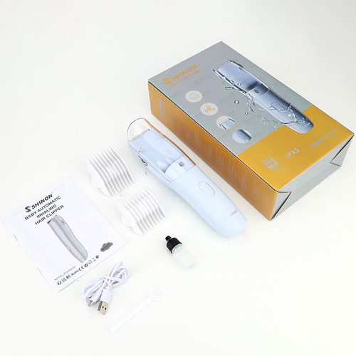 Fully washable, silent electric hair clipper for adults and babies with automatic hair suction.