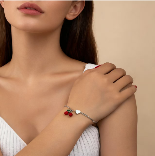 This cherry bracelet is absolutely stunning! The playful cherries paired with the shining hearts make it both exquisite and elegant. Worn on your wrist, it is comfortable and versatile. It holds a positive meaning and is an excellent choice for giving to your loved ones, your best friends, or as a treat for yourself. Don't hesitate to get it!