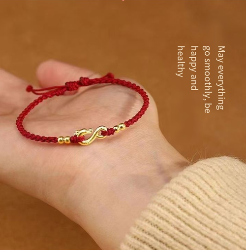 This red rope bracelet with a dragon pattern is meticulously crafted using traditional techniques. The golden dragon pendant depicts the dragon diving into the deep sea, while the golden beads add a touch of elegance. If you place an order today, you will receive four red + wine red + black + green in total - four ancient-style woven red rope bracelets. This is a gentle and lucky item, suitable for personal collection or as a gift.