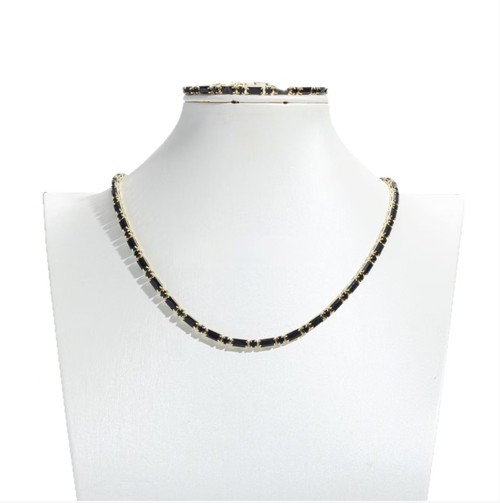 Hip-hop style black zircon necklace and bracelet set, suitable for both men and women. The zircons are neatly set and paired with golden borders, giving a unique texture. The chain body has adjustable clasps, allowing for easy adjustment of the length. It is convenient to wear and take off. It is suitable for daily and party wear. It can be worn as a set or individually. Please pay attention to daily maintenance.