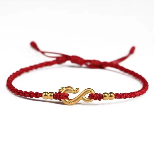 This red rope bracelet with a dragon pattern is meticulously crafted using traditional techniques. The golden dragon pendant depicts the dragon diving into the deep sea, while the golden beads add a touch of elegance. If you place an order today, you will receive four red + wine red + black + green in total - four ancient-style woven red rope bracelets. This is a gentle and lucky item, suitable for personal collection or as a gift.