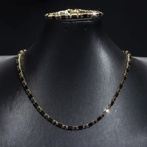 Hip-hop style black zircon necklace and bracelet set, suitable for both men and women. The zircons are neatly set and paired with golden borders, giving a unique texture. The chain body has adjustable clasps, allowing for easy adjustment of the length. It is convenient to wear and take off. It is suitable for daily and party wear. It can be worn as a set or individually. Please pay attention to daily maintenance.