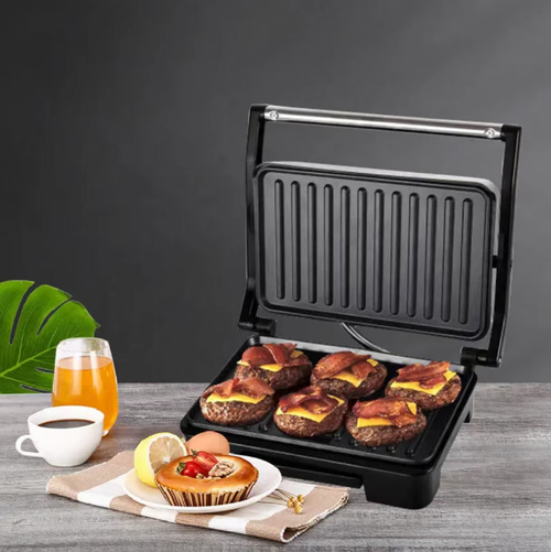 This household multi-functional pan-fry and bake breakfast machine supports 180-degree flattening. It can be used for pressing and baking paninis and frying steaks. The non-stick frying pan is equipped with a drip-catching structure and a heat-resistant handle. It can switch between pressing and baking modes with two pans, suitable for making simple breakfast meals. After cooling, it can be cleaned to avoid scratches on the coating by hard objects.