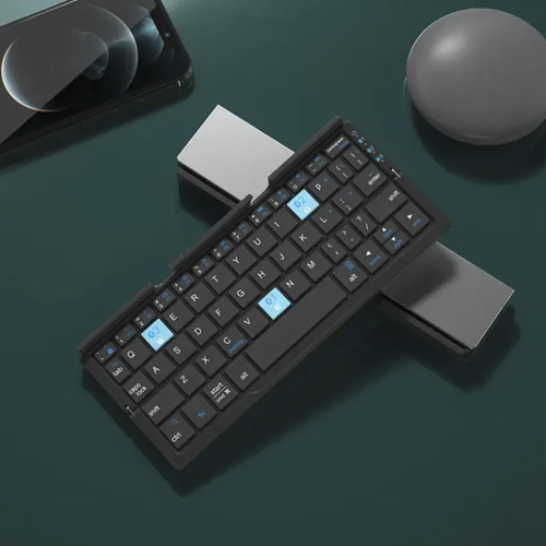 Portable folding Bluetooth keyboard. Folded for storage, it is small and easy to carry. The metal casing is sturdy and durable. Silent keys provide a comfortable feel. Bluetooth quickly connects to mobile phones and tablets. The tapping is quiet and comfortable. Type-C charging offers long battery life. Comes with a built-in device stand. A small keyboard for business trips, online classes and office work.