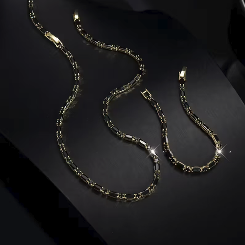 Hip-hop style black zircon necklace and bracelet set, suitable for both men and women. The zircons are neatly set and paired with golden borders, giving a unique texture. The chain body has adjustable clasps, allowing for easy adjustment of the length. It is convenient to wear and take off. It is suitable for daily and party wear. It can be worn as a set or individually. Please pay attention to daily maintenance.
