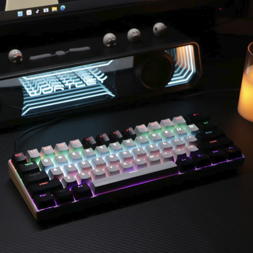 HK61 Mechanical Keyboard with Tea-Style Keys. The 61-key compact layout frees up desk space. The tea-style keys offer a smooth and gentle touch, suitable for both office and gaming use. The mixed light backlighting creates a full atmosphere. The wired single-mode is stable and has no latency. The dual-color keycaps are durable and wear-resistant. It is a high-value, cost-effective keyboard for students and office workers.