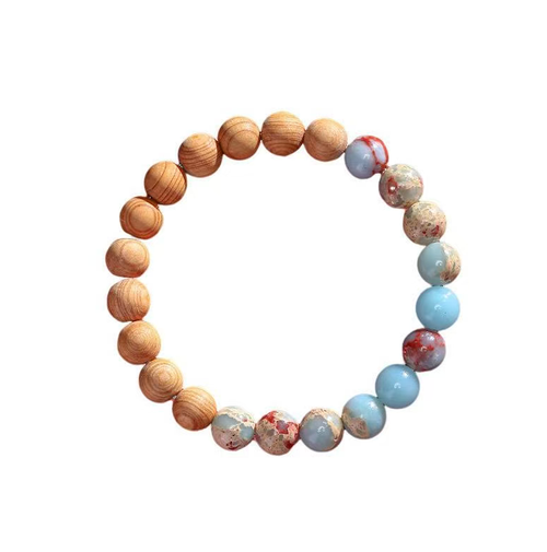 The Cliff Cypress Wealth Energy Bracelet is meticulously crafted using natural cliff cypress and rare gemstones such as Shoushan stone. It exudes a delicate fragrance that boosts energy and brings good fortune. The powerful energy gathers wealth. Order today and we will send you 10 Cliff Cypress Wealth Energy Bracelets. Wearing it will allow the power of nature to protect your path to wealth and keep good luck by your side.