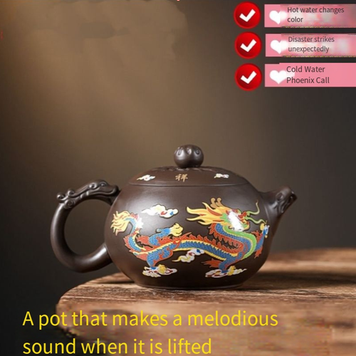 The dragon and phoenix teapot that changes color when it comes into contact with water is a traditional Chinese tea set with unique craftsmanship. It is usually made of purple clay and the body of the teapot is decorated with dragon and phoenix patterns. The color will change when it comes into contact with water. It is extremely exquisite and very suitable for collection.