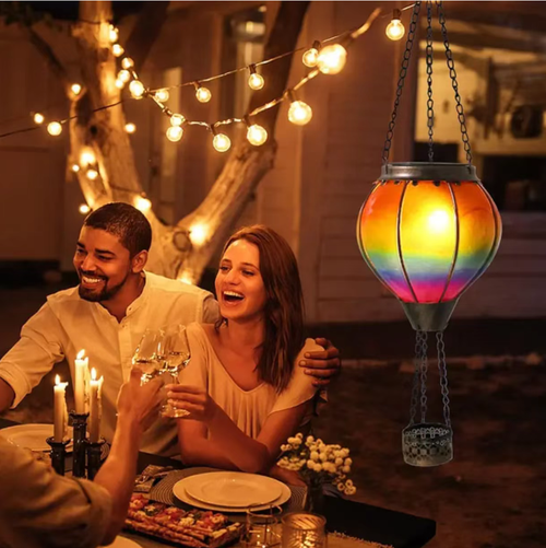 This handcrafted ironwork solar hot air balloon lantern: The artisan has created unique patterns. It can automatically recharge with solar energy without the need for wiring. It is IP65 waterproof and can withstand rain and wind. During the day, it functions as an artistic piece. At night, it emits warm light to create an atmosphere. It is suitable for use in gardens, patios, and balconies. It brings a romantic charm to the four seasons of the yard.
