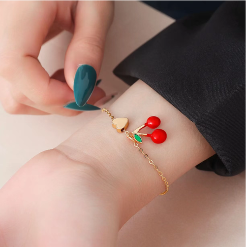 This cherry bracelet is absolutely stunning! The playful cherries paired with the shining hearts make it both exquisite and elegant. Worn on your wrist, it is comfortable and versatile. It holds a positive meaning and is an excellent choice for giving to your loved ones, your best friends, or as a treat for yourself. Don't hesitate to get it!
