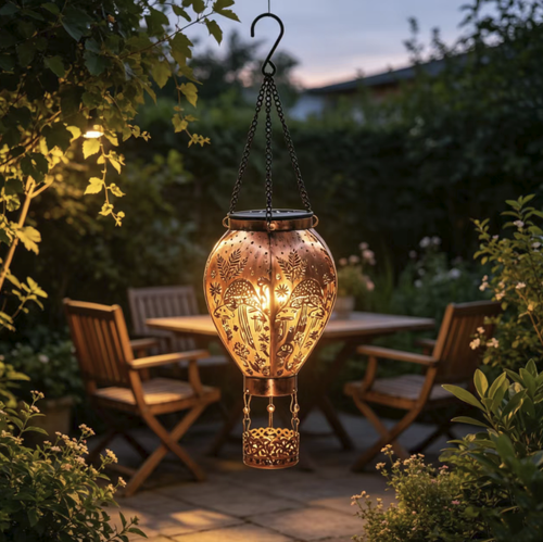 A hot air balloon-shaped solar ironwork pendant light. With a retro distressed material that is rust-proof and waterproof. The design features a hollow mushroom and butterfly pattern. It casts beautiful light at night. Solar-powered for self-charging. Controlled by light, it automatically turns on and off without the need for wiring. Suitable for hanging in the garden or balcony, it can easily create a cozy and pleasant outdoor atmosphere.