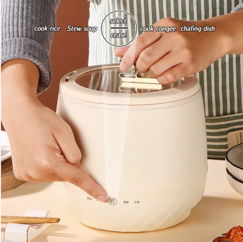 1.8L intelligent mini rice cooker, suitable for 1-2 people's meals, non-stick inner pot for easy cleaning. It supports multiple functions such as cooking rice, making soup, stir-frying, and making hot pot. The milk-white body and rose gold handle give an elegant appearance. It is small and portable, suitable for dormitories, camping, etc. The intelligent touch control operation is simple. The visible window prevents overflow. It is a practical choice for creating a refined one-person meal.