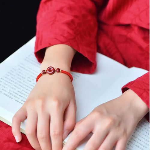 Purple Gold Vermilion Red Peace Love Bracelet. Today, we sold 6 pieces! The bracelet features a high concentration of red vermillion wrapped around a red string. It embodies both auspiciousness and love. Each piece is transparent, the knot is durable, and the wrist size can be adjusted to fit both men and women. Stock up on good luck, and have the vermilion red string wrapped all around your wrist - this wave captures both peace and sweetness perfectly!