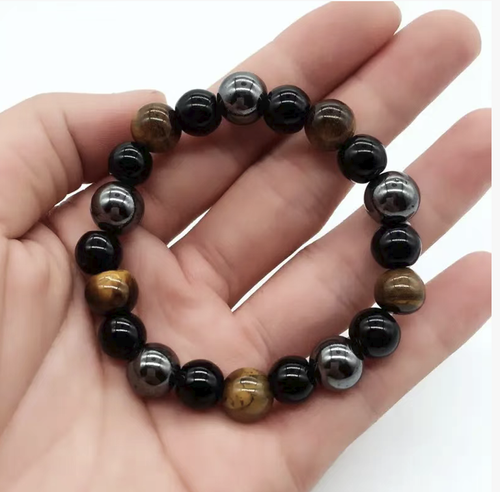 10mm three-color round bead bracelet, featuring imitation tiger eye stone combined with black chalcedony silver-gray polished beads. The beads are smooth and have a lustrous appearance. The elastic rope has a high elasticity and can fit most wrists, making it comfortable to wear without causing any pressure on the hand. It is a simple and neutral style, suitable for both work and casual wear. It is easy to maintain without fading and is suitable for both personal use and as a gift.