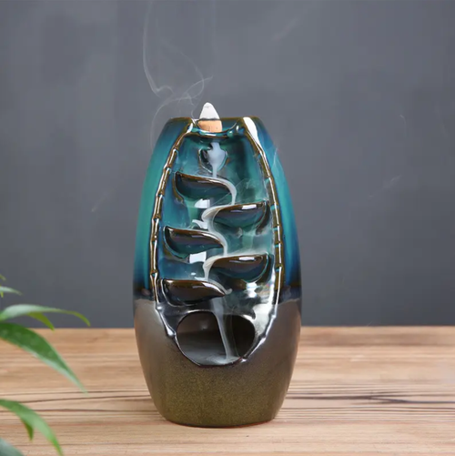 60 fragrant grains, paired with a harmonious and flowing incense burner, feature a dual-color ceramic design that is elegant. The dual-purpose design allows for both electric incense and reverse-flow incense. With 60 different fragrance types, when ignited, the smoke flows like a waterfall, creating a serene atmosphere. This is an excellent addition for home decoration, helping to relieve stress and promote sleep, making life full of poetry and tranquility.