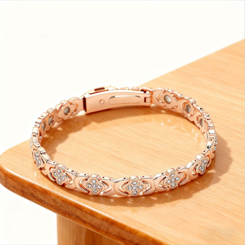 Lucky Grass Diamond Engraved Magnetic Therapy Bracelet. The four-leaf clover holds good luck, while the fine-set zirconia showcases its elegance. The built-in magnet relieves fatigue, and the titanium alloy is resistant to fading. It can be adjusted to fit various wrist sizes and is gentle on the skin. It is versatile for both work and casual wear, and suitable for giving as a gift or keeping for oneself.