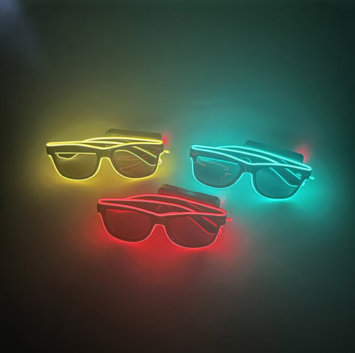 LED Wireless Ray-Ban Light-up Glasses: Classic black frame with neon light effect, available in multiple colors such as purple, blue, yellow, and red. Press the button wirelessly to turn on. Order today and you'll get 3 LED wireless Ray-Ban light-up glasses. They function as sunglasses during the day and instantly become the center of attention at night. Suitable for parties, Halloween, music festivals, adding it to your outfit instantly boosts the atmosphere and comes with a C-level filter.