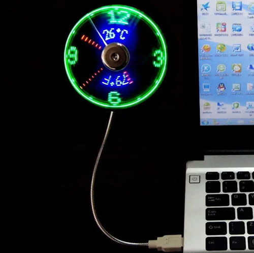 This USB mini fan is amazing! The rotating fan blades are accompanied by a colorful display screen. It not only shows the time but also measures the temperature. The appearance is trendy and cool. The gentle breeze is not irritating. The snake-shaped tube can be easily bent at any angle, and it feels comfortable when blowing on the face or the table. It can be plugged into a computer or a power bank and used immediately. It can be taken with you when going to work, commuting, or in a dormitory.