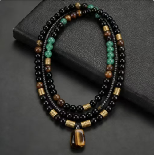 The Tiger Heart Stone Necklace combines the courage of Tiger Eye Stone, the stability of Black Onyx, and the vitality of Green Jadeite. The more you polish it, the more it will display the elegance of a fine piece of jewelry, embodying the strength of both hardness and softness, and conveying the essence of Eastern culture. If you place an order today, you will receive 2 Green Dongling Tiger Eye Stone Enhancing Fortune and Money Magnetic Stone Energy Necklaces.