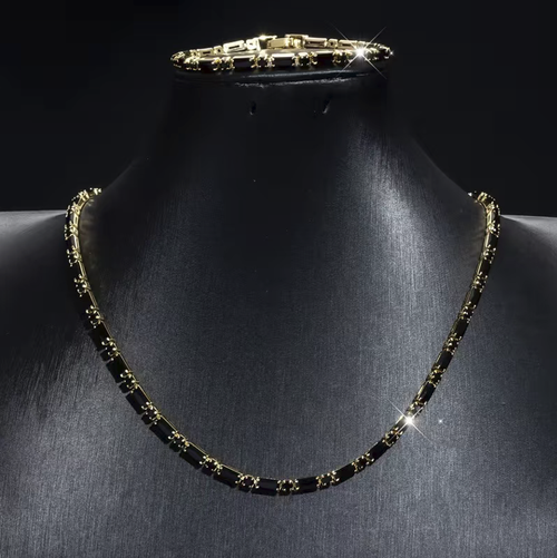 Hip-hop style black zircon necklace and bracelet set, suitable for both men and women. The zircons are neatly set and paired with golden borders, giving a unique texture. The chain body has adjustable clasps, allowing for easy adjustment of the length. It is convenient to wear and take off. It is suitable for daily and party wear. It can be worn as a set or individually. Please pay attention to daily maintenance.