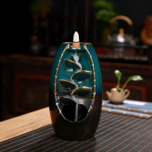 60 fragrant grains, paired with a harmonious and flowing incense burner, feature a dual-color ceramic design that is elegant. The dual-purpose design allows for both electric incense and reverse-flow incense. With 60 different fragrance types, when ignited, the smoke flows like a waterfall, creating a serene atmosphere. This is an excellent addition for home decoration, helping to relieve stress and promote sleep, making life full of poetry and tranquility.