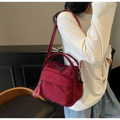 Simple, lightweight, casual, one-shoulder, hand-held, commuter bag for women, new style, fashionable and versatile Oxford cloth messenger bag