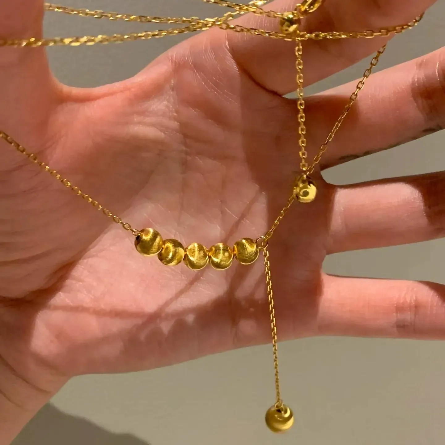 French ins real gold electroplating retractable push-pull cat's eye bean necklace clavicle chain light luxury exquisite