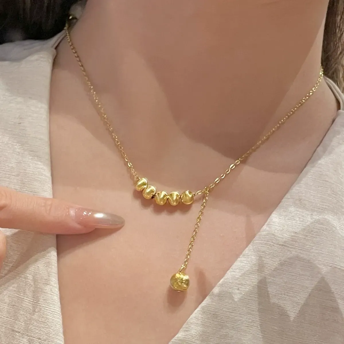 French ins real gold electroplating retractable push-pull cat's eye bean necklace clavicle chain light luxury exquisite
