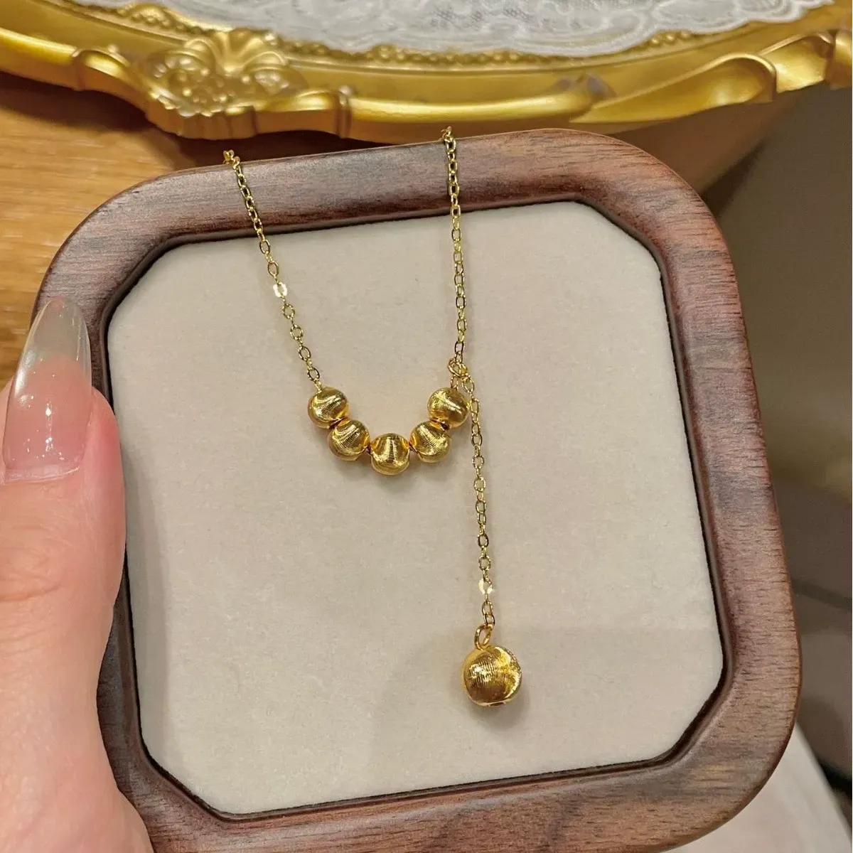 French ins real gold electroplating retractable push-pull cat's eye bean necklace clavicle chain light luxury exquisite