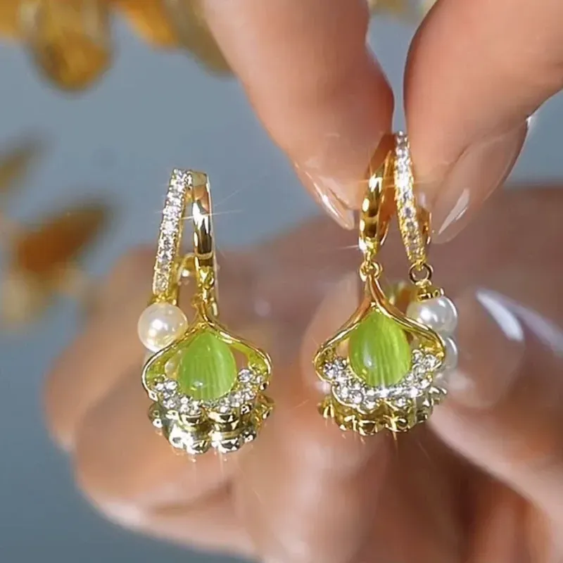 Cat's eye ginkgo leaf pearl earrings 2025 new hot style niche design high-end earrings for women