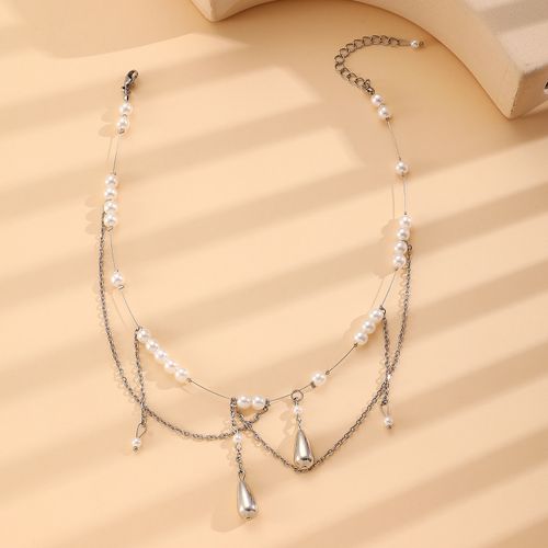 Layered pearl tassel necklaces