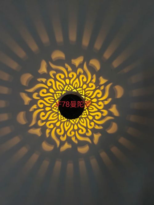 Solar-powered outdoor wall lamp, projector lamp, cylindrical mandala warm light exterior wall lamp