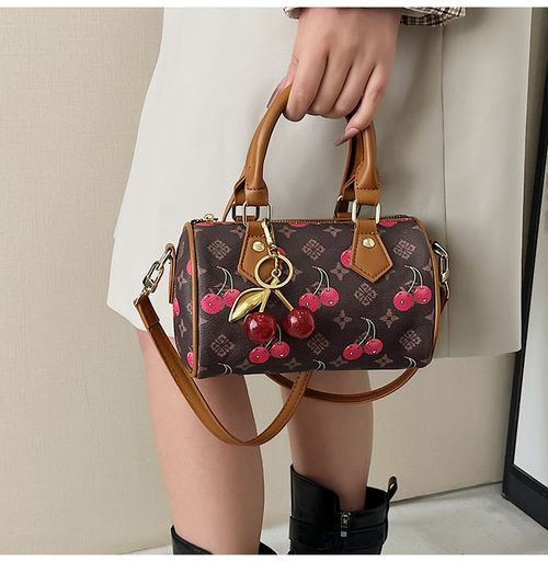 High-end cylindrical bowling bag, unique design, 2026 new style, printed fashion crossbody bag, tote bag, pillow bag.