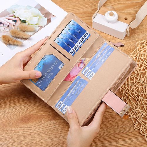 Designer perforated leather women's wallet, handbag, and phone case.