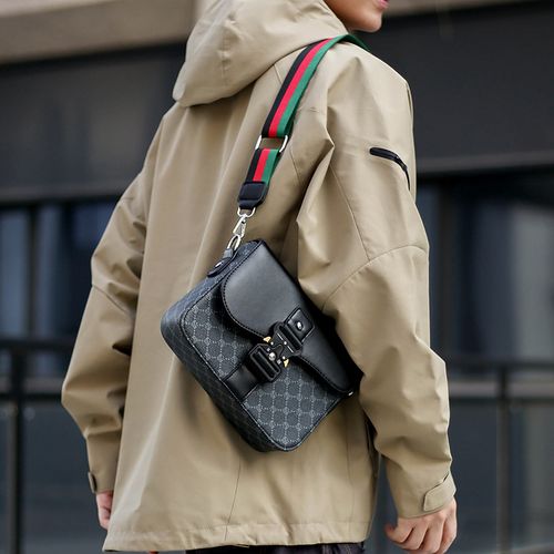 New unisex crossbody bag, saddle bag style with leather flap closure.