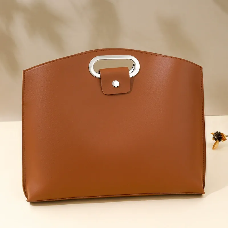 Simple and sophisticated business-style laptop bag for women, new 2025 style, trendy and fashionable, large capacity clutch bag for work and commuting.