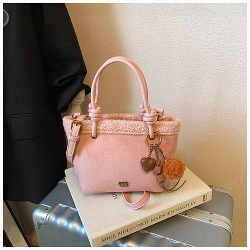 Versatile and stylish handbag, crossbody bag, and small bucket bag.