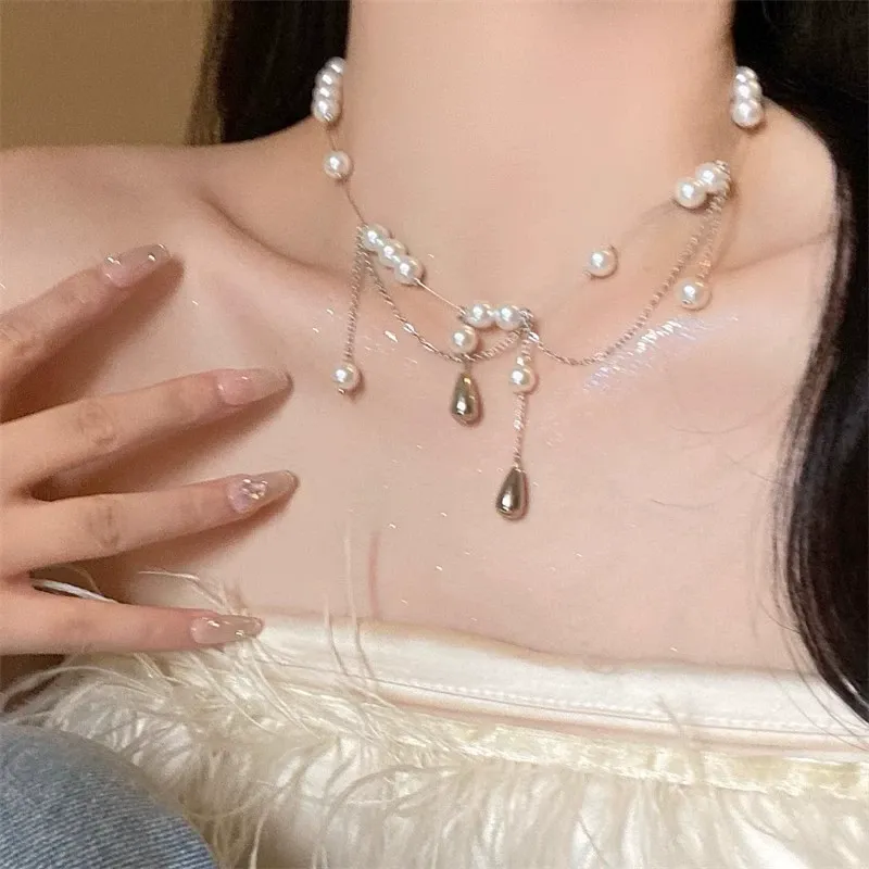 Layered pearl tassel necklaces