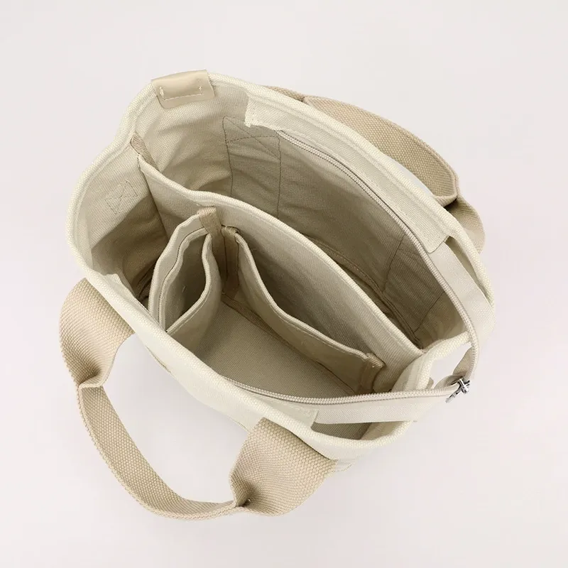 High-value new Japanese-style canvas bag, fashionable, simple, large-capacity tote bag, suitable for daily commuting and multi-purpose lunch bag for women.
