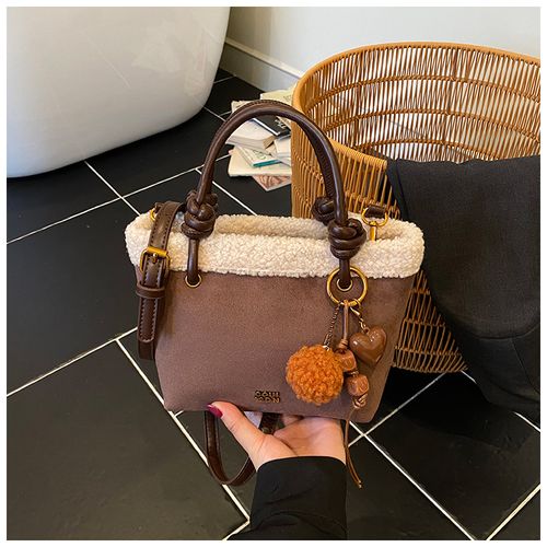 Versatile and stylish handbag, crossbody bag, and small bucket bag.