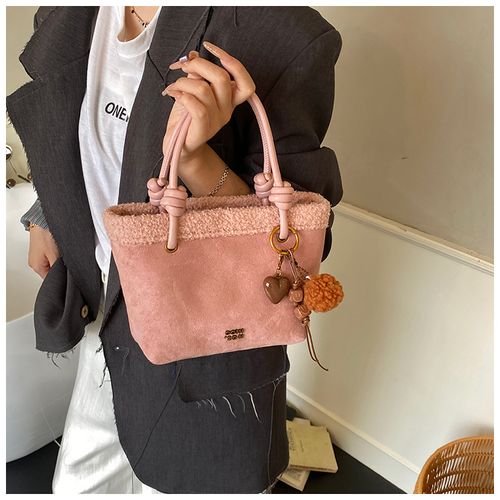 Versatile and stylish handbag, crossbody bag, and small bucket bag.