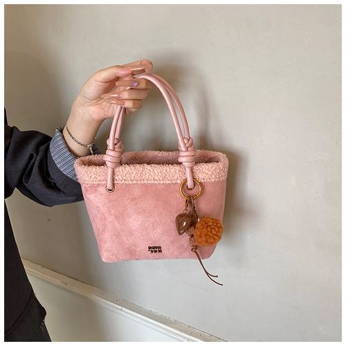 Versatile and stylish handbag, crossbody bag, and small bucket bag.