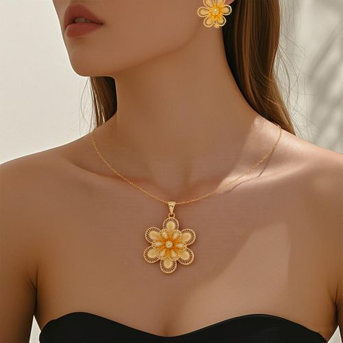 Heavy-duty gold teardrop hollow earrings, high-end French palace style necklace earrings jewelry set