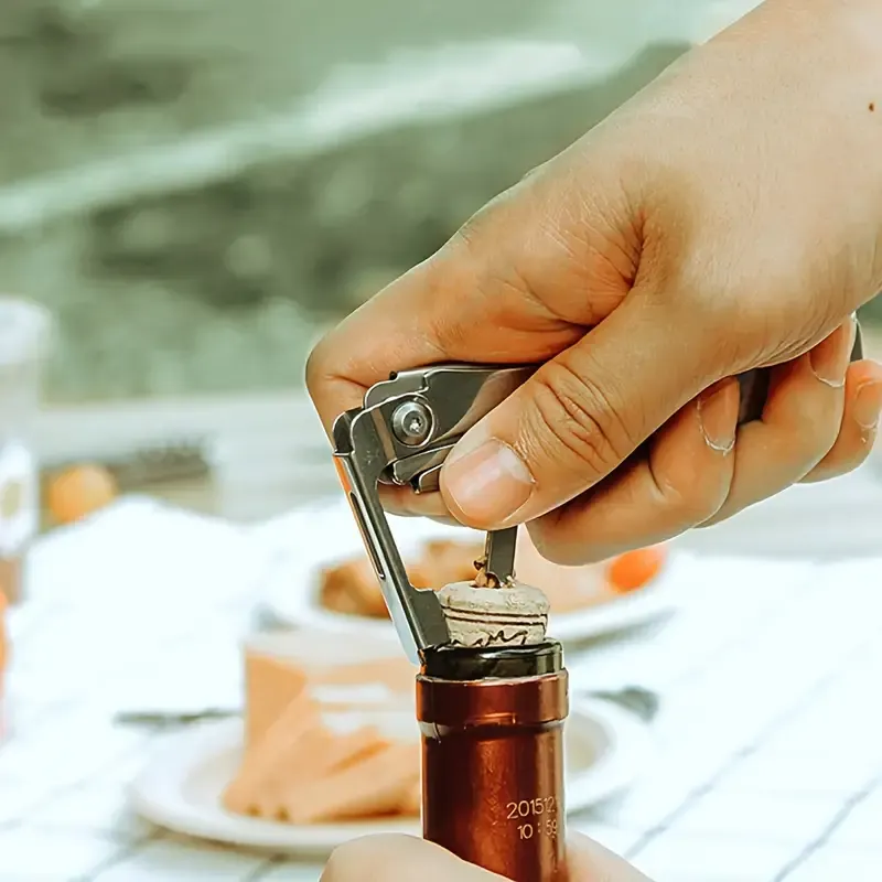 A Versatile Folding Outdoor Tableware Set With 5 In 1, Including Knife, Fork, Spoon, Bottle Opener, Made Of Stainless Steel, Easy To Clean, And Comes With A Storage Bag, Perfect For Camping.